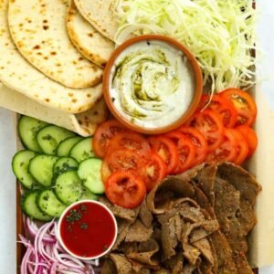 ❤️❤️ mix doner mealmix doner meal served with rice, salad ,two dips and bread